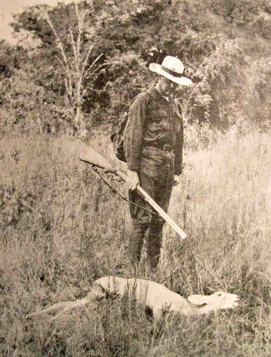 Whelen with a small deer taken with Peach’s .30-30 under barrel.